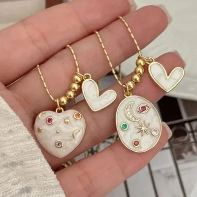 Художественное овальное эмалевое ожерелье со звездами из диоксида циркония, покрытое 18-каратным золотом - Изображение 1 из 4