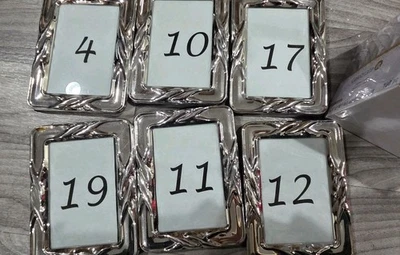 6 marcos de números de mesa de boda plateados 6x4 con 100 burbujas Foto 1 de 4