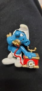 Figura PVC "Teléfono" Pitufo - Cuna delgada de 1980 (JF25 - Imagen 1 de 3