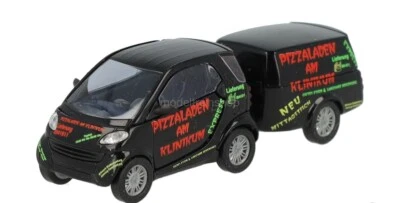 Spur H0 M: 1:87 BUSCH 48961 Smart City Coupé Con Clevertrailer Nuovo OVP - Immagine 1 di 2