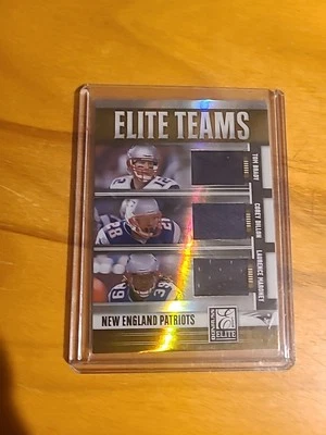 2007 Donruss Elite Brady/Dillon/Maroney Elite Teams Jersey Card [30/99] Rare - Image 1 of 4