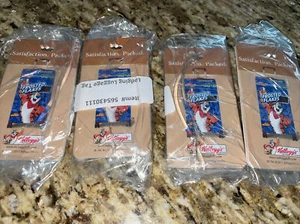 Posten von vier Kofferanhängern, Kunststoff, Kellogg's mattierte Flocken, neu in Verpackung. Tony der Tiger - Bild 1 von 5