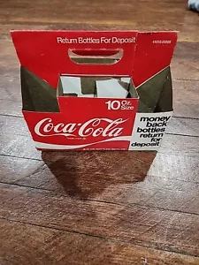 Paquete de 8 botellas de cartón vintage de Coca Cola de 10 OZ de los años 70 - Imagen 1 de 10