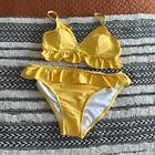 Free press women’s ruffle triangle bikini top is a small nwt bottoms are medium