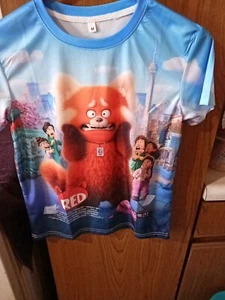 Kinder Tshirt "Turning Red".  Blau mit buntem Design.  Neu ohne Etikett. Medium - Bild 1 von 6