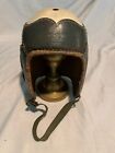 Vintage Nokona leather football helmet with wing front and hard shell crown