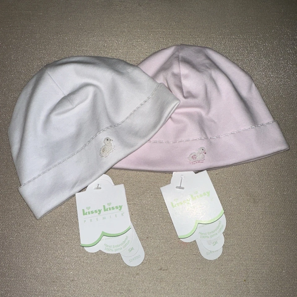 Paquete de 2 sombreros Kissy Kissy bebé pato pequeño blanco y rosa nuevos con etiquetas Foto 1 de 4