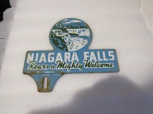 Vintage Niagara Falls Roars Mighty Welcome Metal Car Badge License Plate Topper - Picture 1 of 2