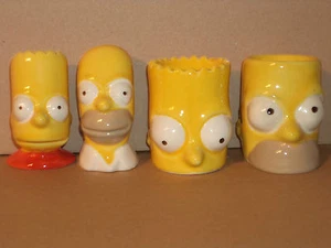 Sammlung SIMPSONS BART und HOMER als EIERBECHER und SALZ UND PFEFFER STREUER NEU - Bild 1 von 1