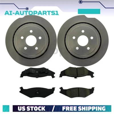 For 1991 1992 1993 1994 1995 Dodge Spirit Rear Brake Rotors + Brake Pads Kit - Image 1 of 4