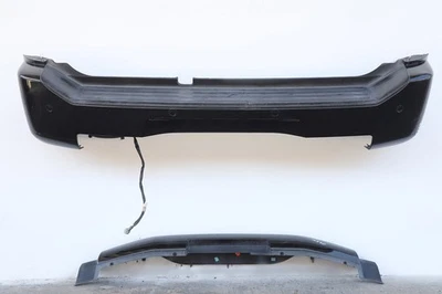 Cubierta de parachoques trasero Infiniti QX56 04-08 2 piezas con sonar de asistencia de estacionamiento negro, A947, O Foto 1 de 4