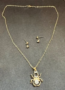 Collana e orecchini pendenti ragno tono oro strass cristalli - Foto 1 di 6