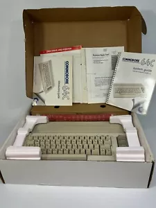 Personal computer Commodore 64c anni 80 in scatola con inserti manuali e documenti - Foto 1 di 22