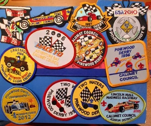 BSAMixed Lot of 12 Assorted Pinewood Derby patches. #11 - Picture 1 of 1