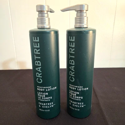 2 bombas de loción corporal Crabtree y Evelyn con botella verde de montaje en pared Foto 1 de 2