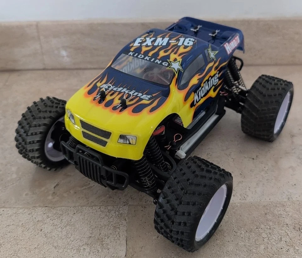AUTO RADIOCOMANDATA 2.4GHZ EXM-16 MONSTER TRUCK 1:16 MOTORE RC-380 RTR HIMOTO  - Immagine 1 di 4