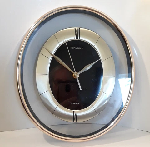 HEIRLOOM 661D Quartz Oval Wall Clock See Thru Mid Century Style Vintage Works Cover