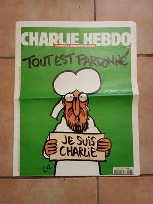 Journal CHARLIE HEBDO N°1178 " TOUT EST PARDONNÉ" très Bon État - Photo 1/2