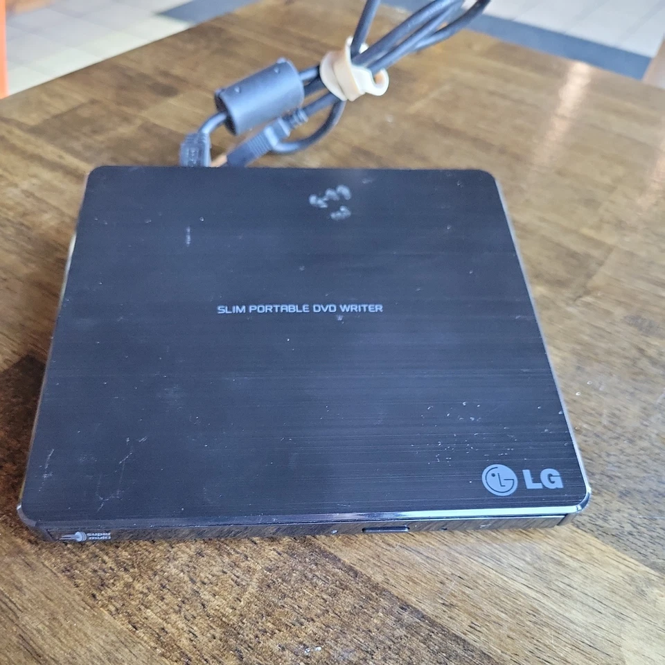 LG SP60NB50 Ultra Delgado Portátil DVD Multi Grabadora PROBADO ENVÍO GRATUITO Foto 1 de 2