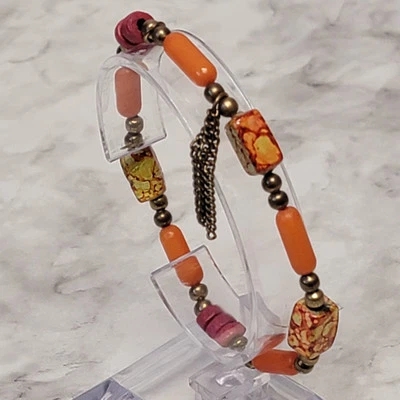 Orange Beaded Bracelet Red Brass Tone Tassel Mottled Rectangular Stretch Boho - Image 1 of 4