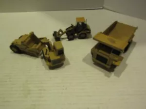 LOT TRUCKS DIECAST CAT CONSTRUCTION 1:64 SCALE MINE ORE HAULER LOADER SCRAPER - Picture 1 of 5