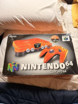 Consola doméstica Nintendo 64 edición Daiei Hawks - naranja y negra en caja N64 Foto 1 de 4