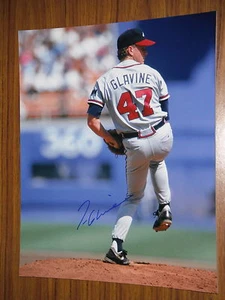 ATLANTA BRAVES TOM GLAVINE SIGNED PITCHING 11X14 - Picture 1 of 1