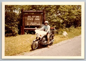 Riding through Big Pocono State Park on a Honda Motorcycle Vintage Photo 1970. - Picture 1 of 2