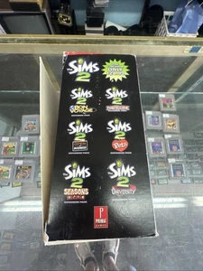 Sims 2 : 7 Complete Strategy Guides for Your Favorite the Sims 2 Games! Torn - Picture 1 of 22