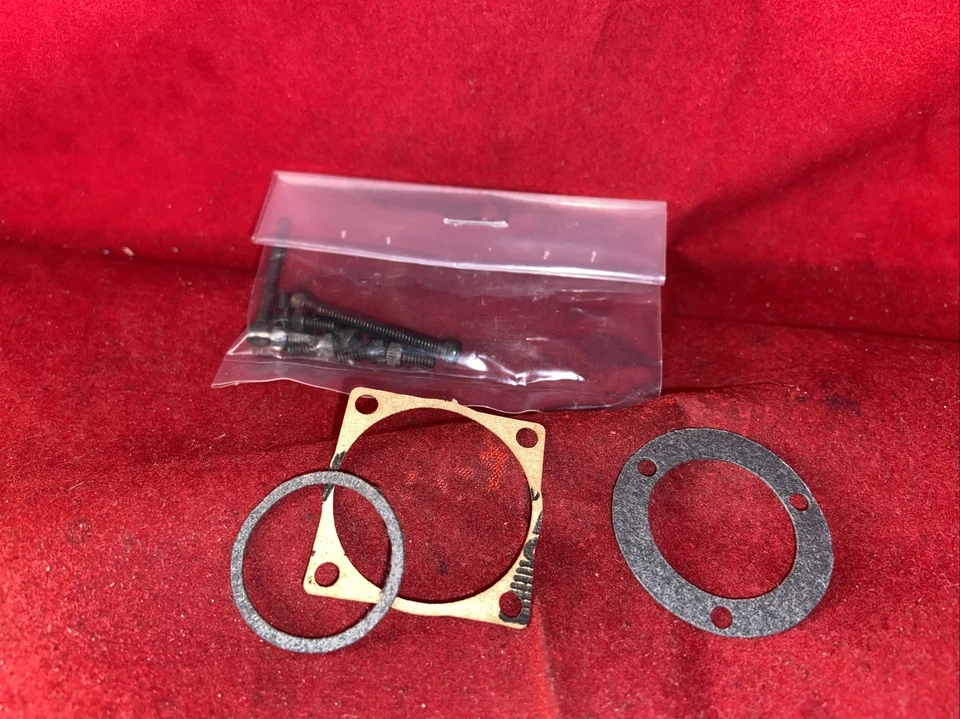 McCoy 35 RED HEAD FRONT ROTOR GASKET & ALLEN  TYPE SCREW SET NIP - Image 1 of 3