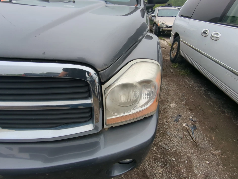 Dodge Durango 2004-2005 conductor izquierdo OEM luz faro lámpara NDYW8 Foto 1 de 1