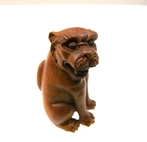 Netsuke signierte japanische Netsuke Löwe / Hund Handgeschnitztes Holz - Bild 1 von 5