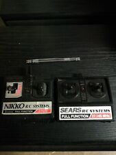 2 Vintage remote controls 1 SEARS made by Nikko and 1 NIKKO R/C SYSTEMS 27 MHz