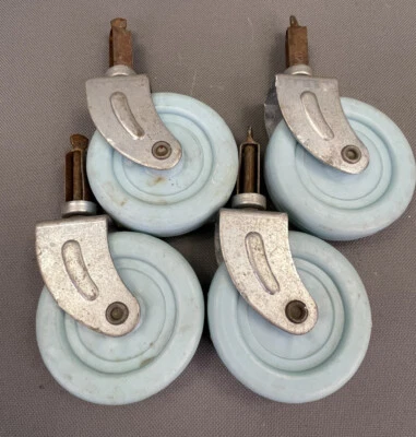 4 vintage plastic furniture casters - 1.5” pin & 2.75" diameter blue  wheels - Image 1 of 4
