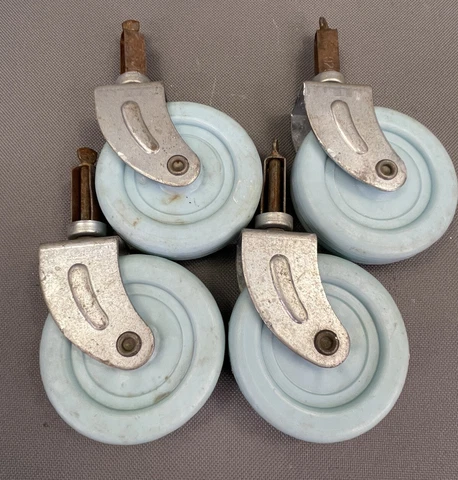 4 vintage plastic furniture casters - 1.5” pin & 2.75" diameter blue  wheels Cover
