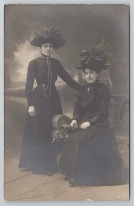 RPPC Edwardian Woman Dressed in Black Wearing Lovely Hats Fashion Millinery - Picture 1 of 4