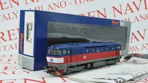 ROCO 72944 - H0 1/87 - DIESELLOKOMOTIVE 749.121-0 BLAU/ROT/WEISS CD - EP.V-VI - Picture 1 of 2