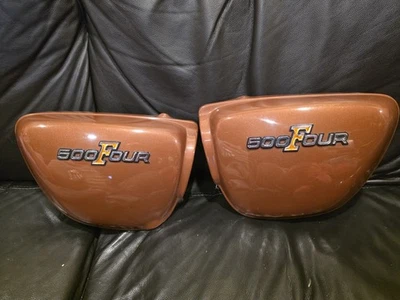 Juego de cubiertas laterales izquierda y derecha Honda OEM marrón 1970-1972 CB500 CB550 Foto 1 de 4