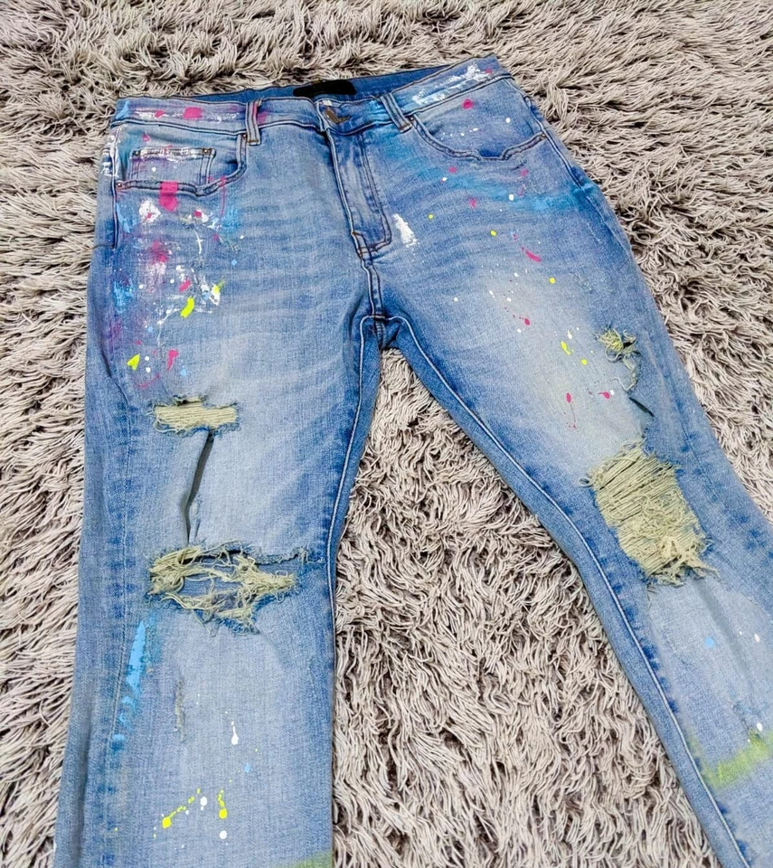 Jeans salpicados de pintura multicolor azul claro Amiri - 34 EE. UU. Foto 1 de 4