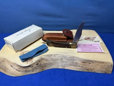 Cuchillo SCHRADE + Tío Henry Lockback LB7 con funda de cinturón de cuero y caja de papel Foto 1 de 4