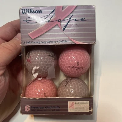 Paquete de 6 pelotas de golf Wilson Hope rosa púrpura sensación suave investigación cáncer de mama nuevo Foto 1 de 2