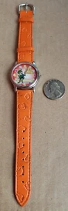 General Mills Müsli Armbanduhr Glücksbringer Kobold Regenbogen Nelsonic Orange - Bild 1 von 15