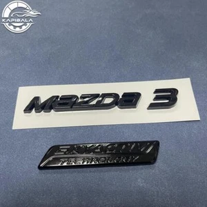 2x SKYACTIV TECHNOLOGY & Maz-d-a 3 Rear Trunk Emblem Badge Gloss Black For Axela - Bild 1 von 4