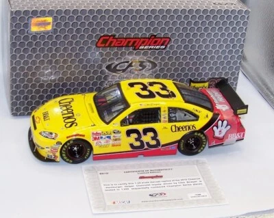 1:24 CHECKERED FLAG CFS CHAMPION 2010 #33 CHEERIOS IMPALA SS CLINT BOWYER 1/1200 - Image 1 of 4