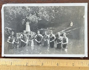Photo, Men and Women Cross holding Hands in Water, Woman on Rock in Back - Picture 1 of 2