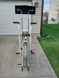 White Schwinn AirDyne Exercise Bike w/ Electronic Display and Book Rack - Picture 1 of 6