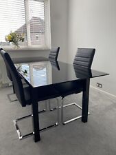  4-6 seater glass dining table including 4 dining chairs