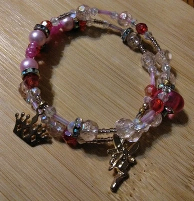 Handmade 15in Wrap Bracelet-Plastic, Glass, Rhinestone Spacers-2 Goldtone Charms - Image 1 of 4