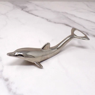 Abridor de botellas vintage plateado delfín (años 60) Foto 1 de 4