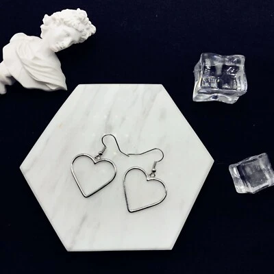 Pendientes de joyería de mujer de moda Simple Hollow Love Heart Borla Retro Gancho 0618 Foto 1 de 4